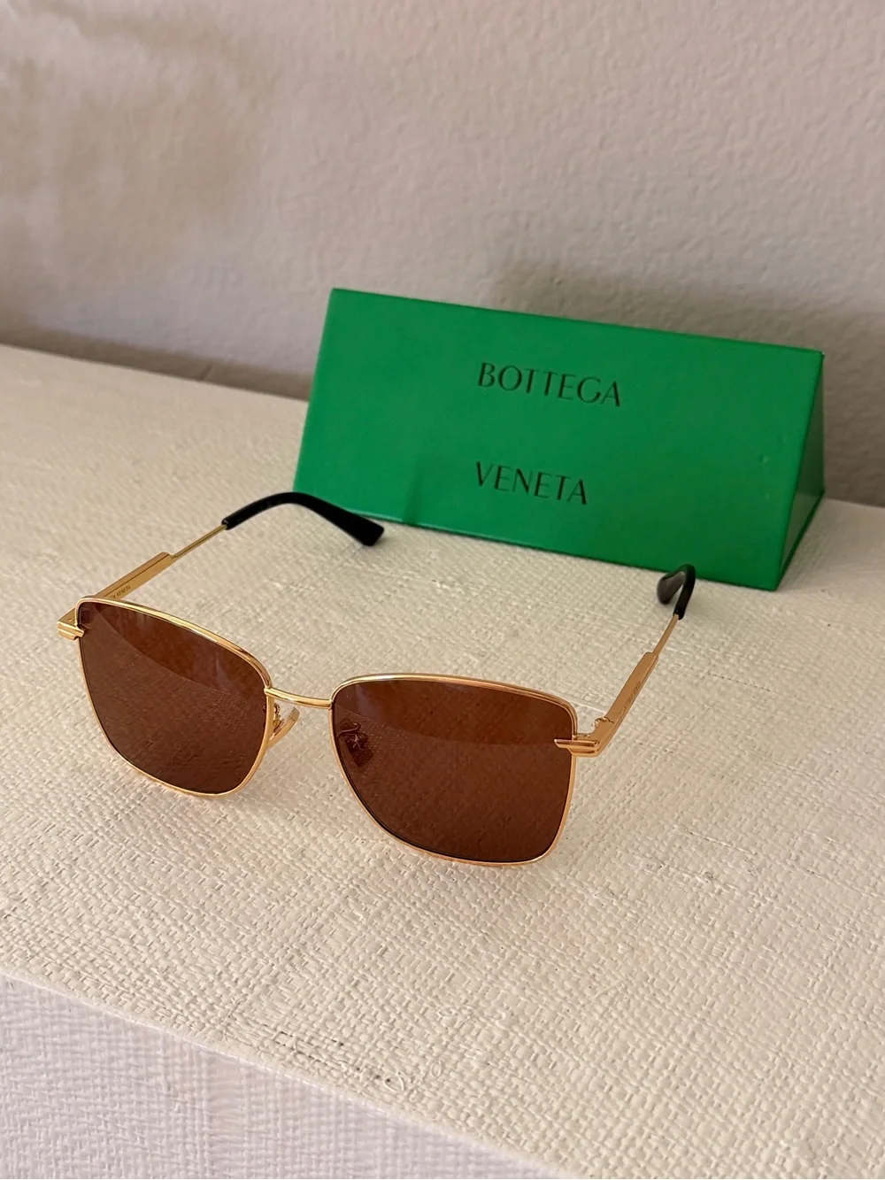 Bottega Veneta Gold Frame Sunglasses with Brown Lenses